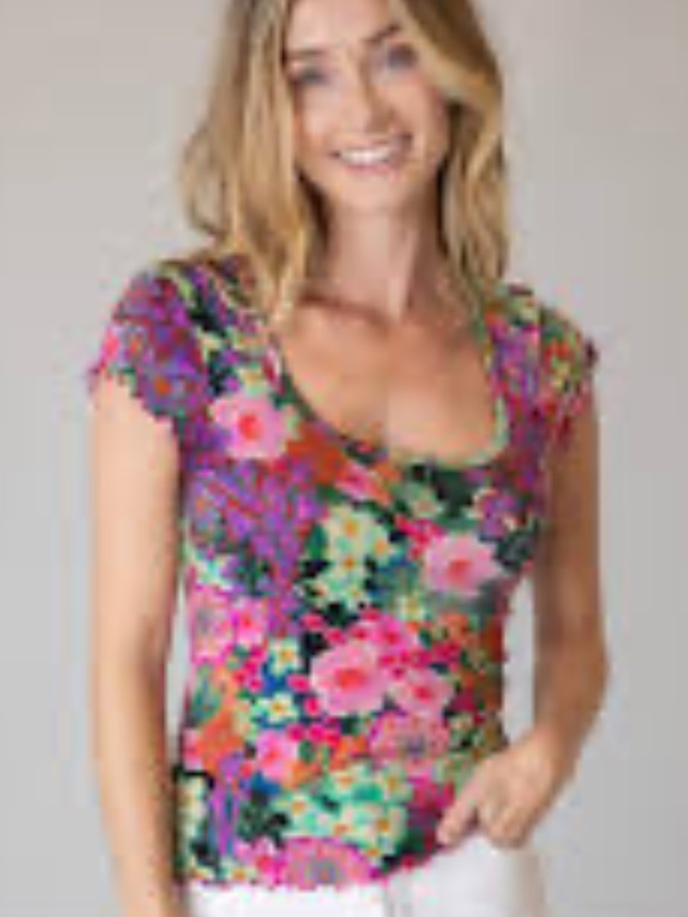 Natural Life buttersoft scoop-neck top features a vibrant multi-color floral LG